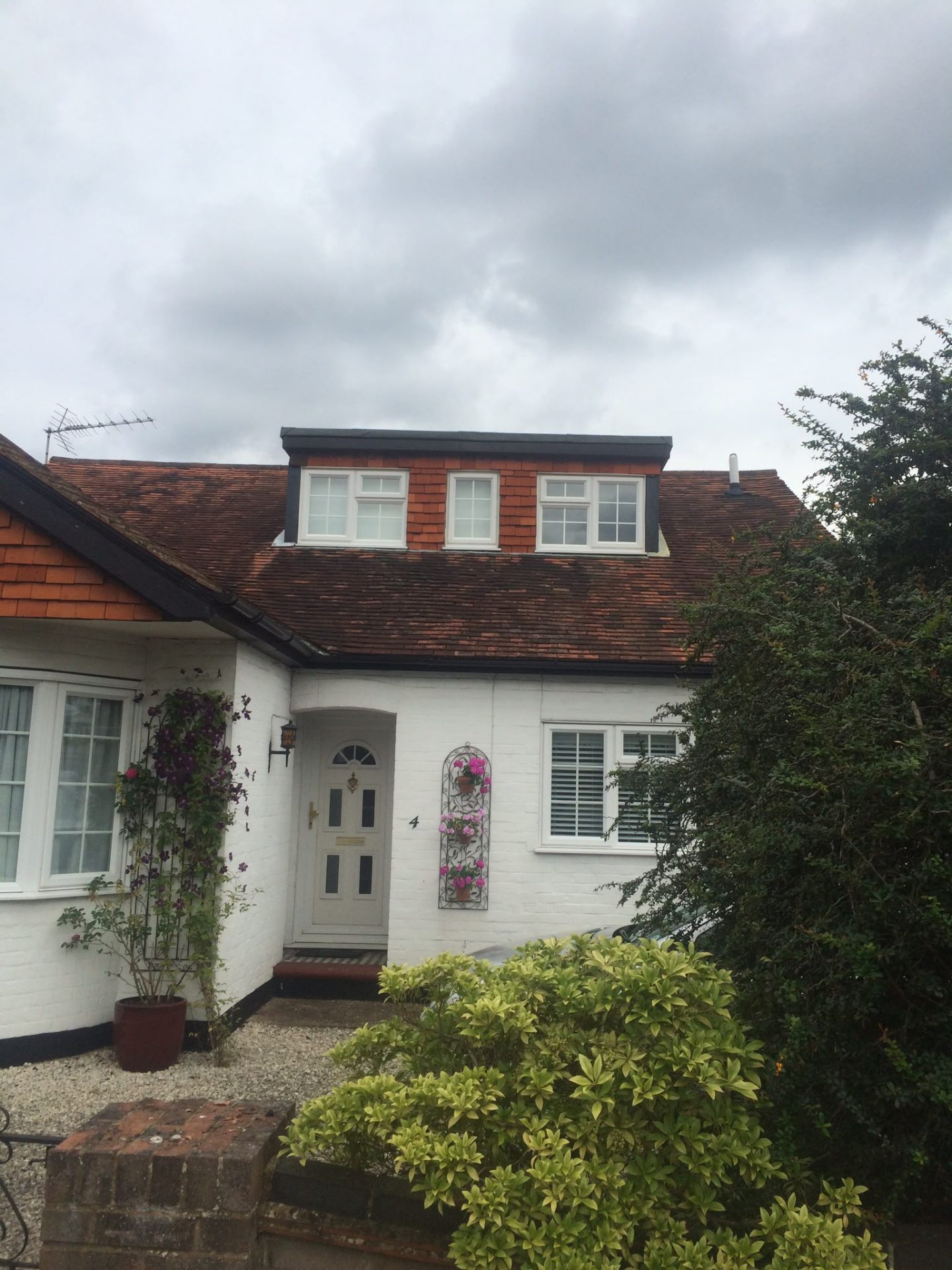 Re-roof with dormer, new battens and tiles finished