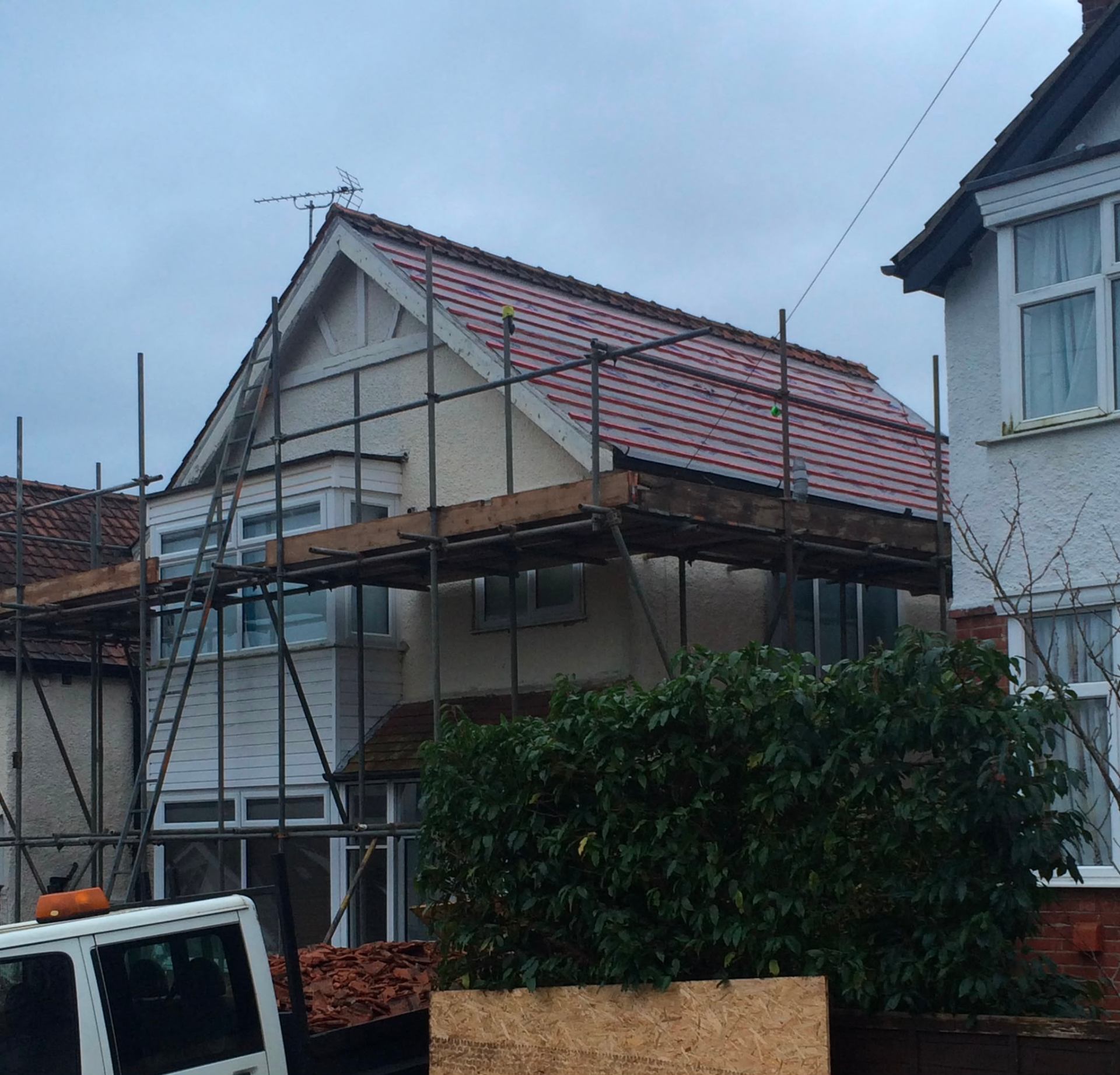 New breathable roofing membrane laid over rafters during a re-roof in Chippenham