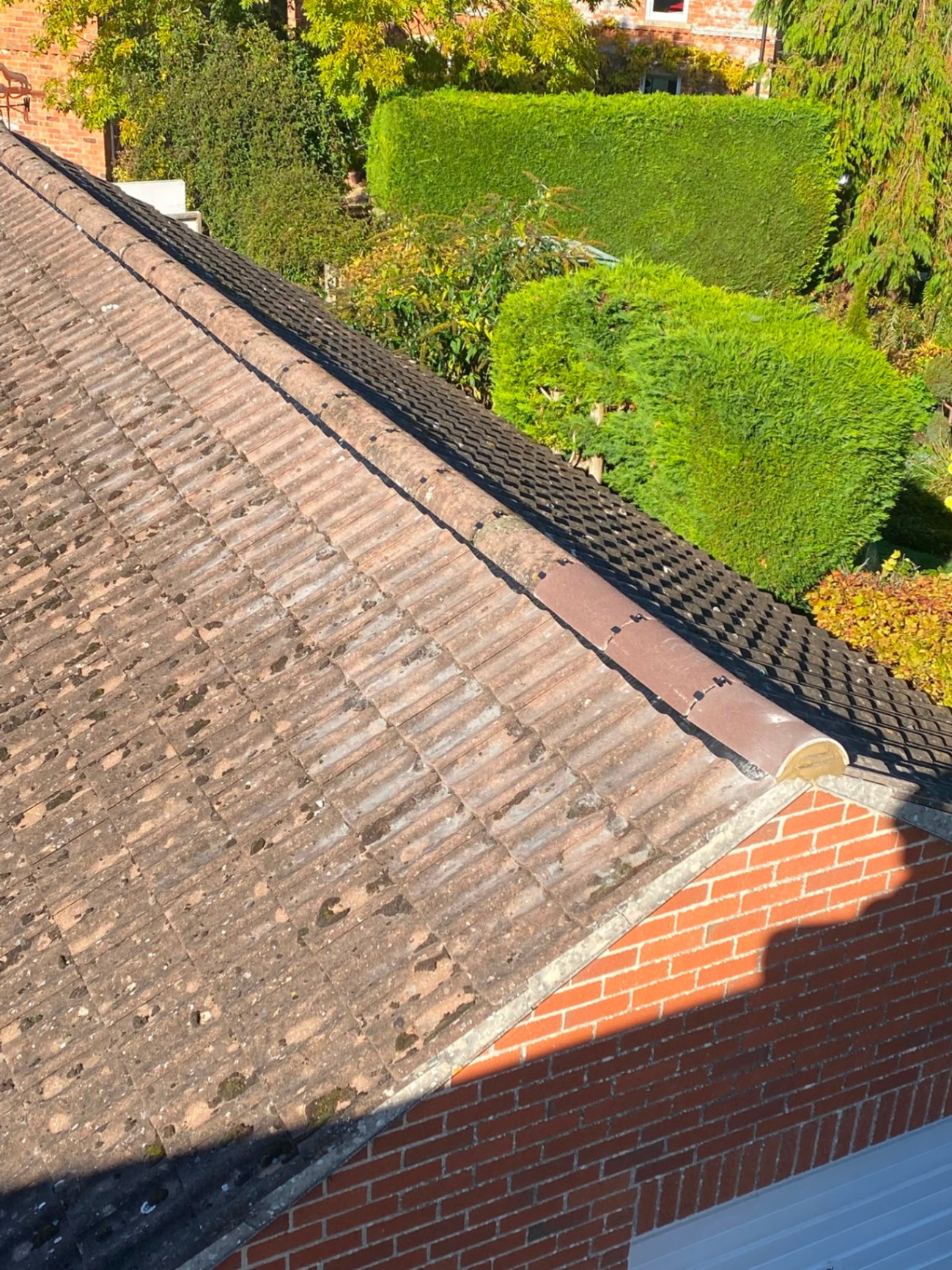 New ridge tiles and dry ridge system fitted in Chippenham