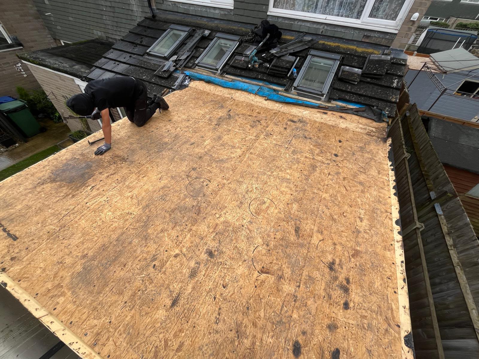 New OSB flat roof decking prepared before the covering is laid